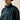 Ariat Caldwell Logo 1/4 Zip Sweater in Dark Teal Southwest — embroidered logo and mock collar. Detail view.