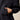 Ariat Compass 1/2 Zip Sweatshirt in Black — zippered hand pocket and ribbed cuff. Detail view.