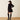 Ariat Nocturne Dress in Black — cinched waist, A-line skirt. Back view on model.