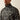 Ariat Caldwell 1/4 Zip Sweater in Storm Front Southwest — mock collar and chest logo. Detail view.