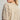 Eesome cropped leopard print knit top in Honey — drop shoulder and cropped length. Side on-model.