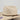 Resistol Conley straw cowboy hat in Natural/Tan — brown ribbon band with Resistol pin. Crown detail.