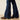 Ariat Jordyn Flare Jean in Mina — 20-inch flare hem over boots. Detail view.
