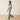 Ariat Hasley Boot Cut Jean in Porto — boot cut leg. Full-length view on model.