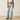Ariat Tomboy Wide Leg Jean in Zuma — destroyed knees, wide leg. Front view on model.
