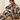 Ariat Dreams Pajama Set in Pony Play — cow-spot print set. Lifestyle view on model.