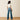 Ariat Mavis Wide Leg Jean in Delaware — wide leg, let-down hem. Back view on model.