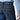 Circle A Western and Work Ariat men's loose fit flame-resistant denim jeans in a medium wash with contrast stitching and reinforced pockets.