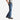 Circle A Western and Work Ariat men's loose fit, straight leg, medium wash denim jeans with brown stitching and belt.