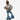 Toddler wearing a Circle A Western and Work Aztec print jacket with ruffled bell-bottom jeans on a country road