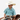 Circle A Western and Work boy wearing a blue patterned short sleeve polo shirt and white cowboy hat on a horse