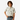 A young boy wearing a Circle A Western and Work Ariat Venttek Outbound short sleeve shirt in a papyrus leaf print.