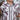 Circle A Western and Work boys' white short sleeve western snap shirt with purple stripes, tortoise buttons, paired with jeans.