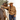 Circle A Western and Work camel knit sweater featuring western ranch scenes, horses, and cacti worn by a cowgirl