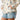 Circle A Western and Work cream pullover windbreaker jacket with cowboy and horse print, kangaroo pocket, and cinchable hem.