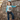 Circle A Western and Work toddler girl wearing a blue and white long sleeve shirt with a cowgirl and horse graphic