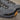 Circle A Western and Work Danner gray textile composite toe work shoes with black and gold laces and tan sole accents.