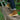 Circle A Western and Work Danner Logger Moc 917 boots in bone brown nubuck leather with Vibram sole on a concrete ledge