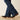 Circle A Western and Work: Women's dark wash denim jeans with a slim fit and flared leg, featuring a contoured waistband and zipper fly.