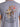Circle A Western and Work Indigo graphic tee with a cowboy riding a bucking horse and "Panhandle Slim" text.