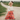 Toddler wearing Circle A Western and Work cream lace neck onesie with a red horse print skirt on a country path