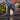 Circle A Western and Work Muck Rainscape black vulcanized rubber rain boots with adjustable buckle on a woman