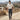Circle A Western and Work off-white short sleeve men's pearl snap shirt with two chest pockets and a lightweight, breathable fabric.