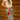 Circle A Western and Work olive barrel-leg jeans featuring a large red embroidered rose and cargo pockets