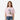 Girl wearing a Circle A Western and Work pink jersey knit t-shirt with a large sequined cowboy boot and cactus patch.