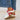 Circle A Western and Work Very G Retro 2 white and red slip-on sneakers with gingham laces worn with blue jeans