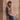 Circle A Western and Work tan microsuede Wilona vest with paisley embossing worn by a woman against a brick wall