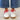 Circle A Western and Work Very G Retro 2 white sneakers with red gingham laces worn with blue denim jeans