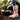 Circle A Western and Work Muck Rainscape woodrose rubber rain boot with adjustable back gusset in a garden setting