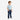 Toddler boy wearing Circle A Western and Work Wrangler denim jeans with a light blue t-shirt and white sneakers