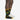 Darn Tough Field Guide Crew Lightweight sock in Charcoal — worn with a sneaker. On model.