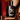 Hooey Original Cologne 3.4 oz — bottle on saddle leather. Lifestyle view.