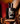 Hooey Original Cologne 3.4 oz — bottle on saddle leather. Lifestyle view.