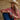 Hooey West Desperado Perfume 1.7 oz — held by a cowgirl. Lifestyle view.