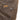 Outback Trading Landsman Vest in Brown — dual-entry hip pocket. Hip pocket detail.