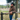 Circle A Western and Work Outback Trading brown pebble-texture vest with Berber lining worn by a man in a cowboy hat